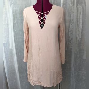 Pale pink dress with lace up details by ASTR